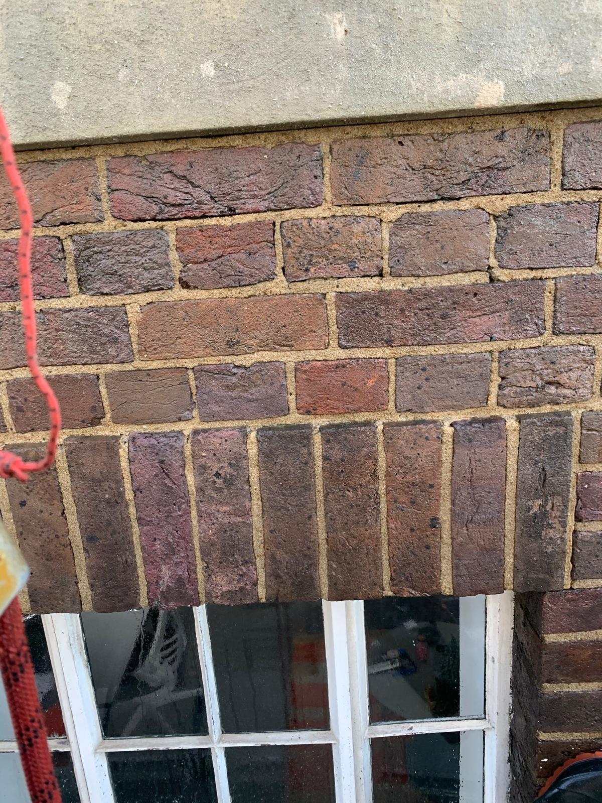 Cleaning Exterior Walls using Rope Access (Abseil) cleaning techniques