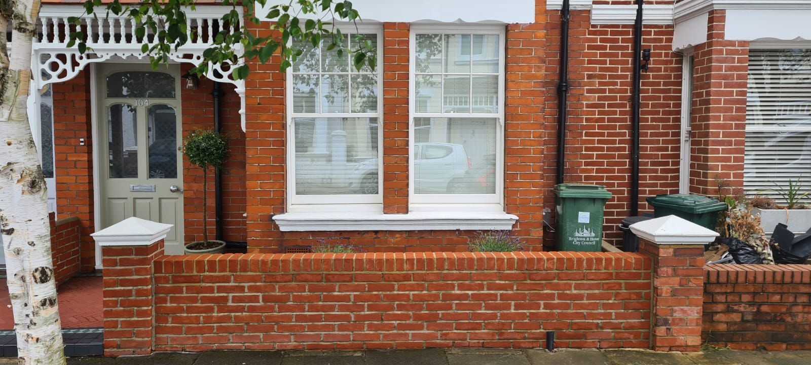 Cleaned Brick wall outside a terraced house