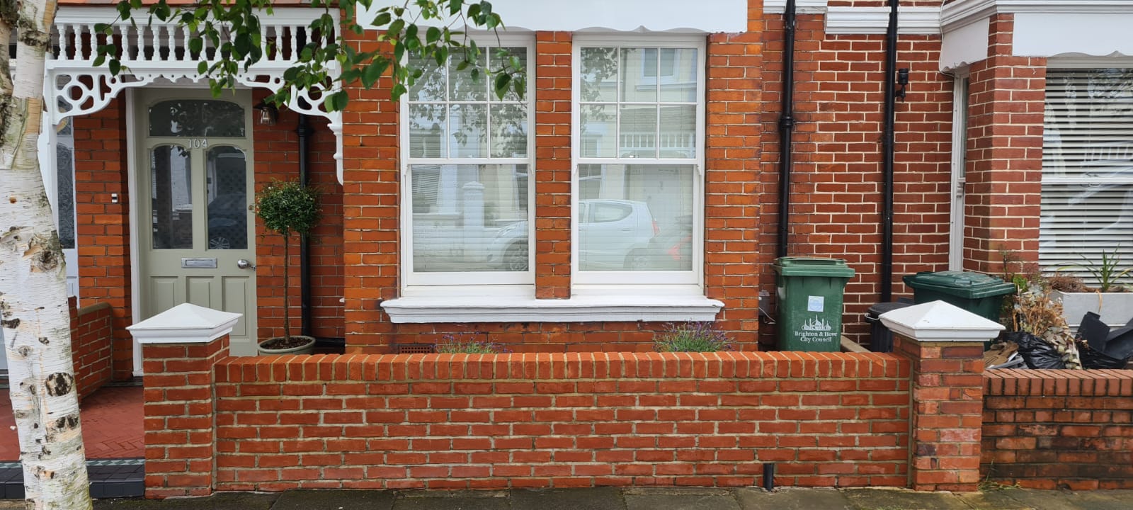 Cleaned Brick wall outside a terraced house