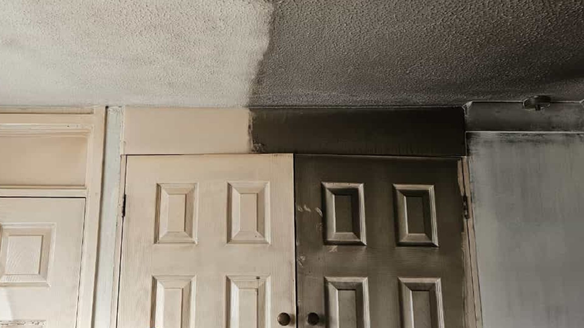 Soot covering half a doorway to help illustrate Vinci Response's professional services.