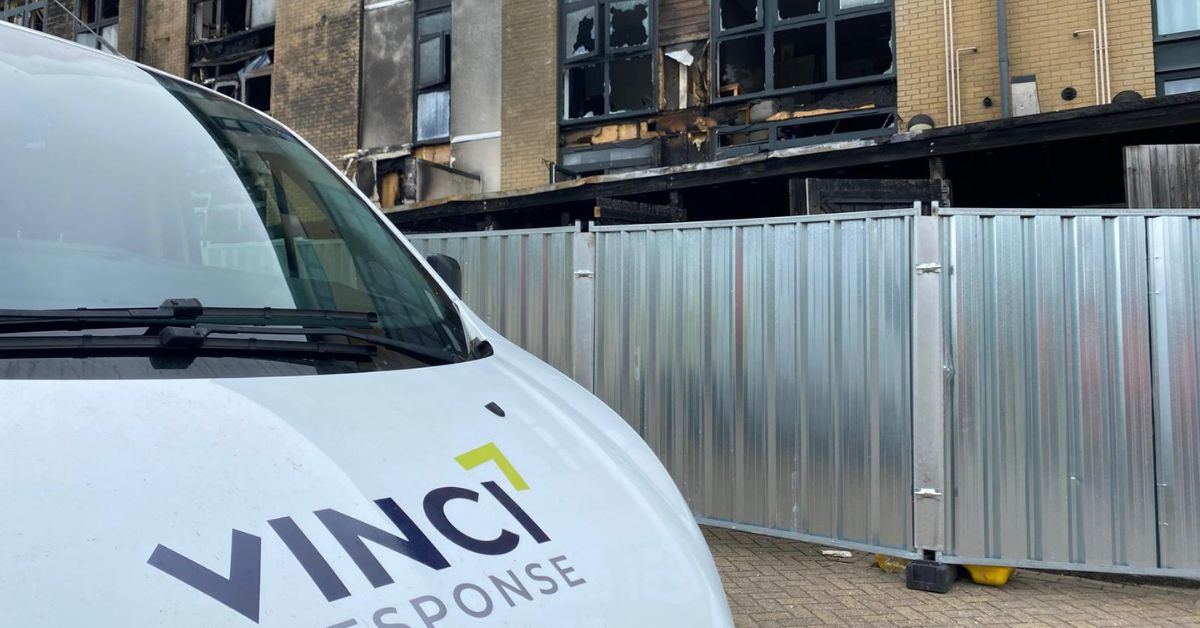 Vinci Response van onsite at a fire-damaged residential building, ready for decontamination and restoration work