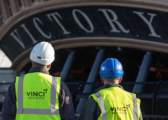 Vinci technicians working to clean the HMS Victory Dry dock, Portsmouth Historic Dockyard.