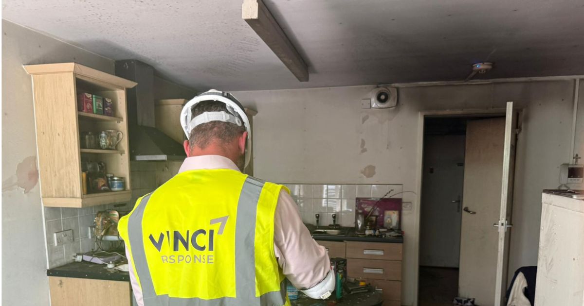 Vinci technician assessing fire damage in commercial kitchen